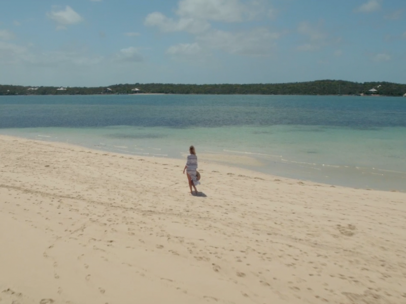 Brand Center | Beach: Lady walking on beach | caribbeantravel.com