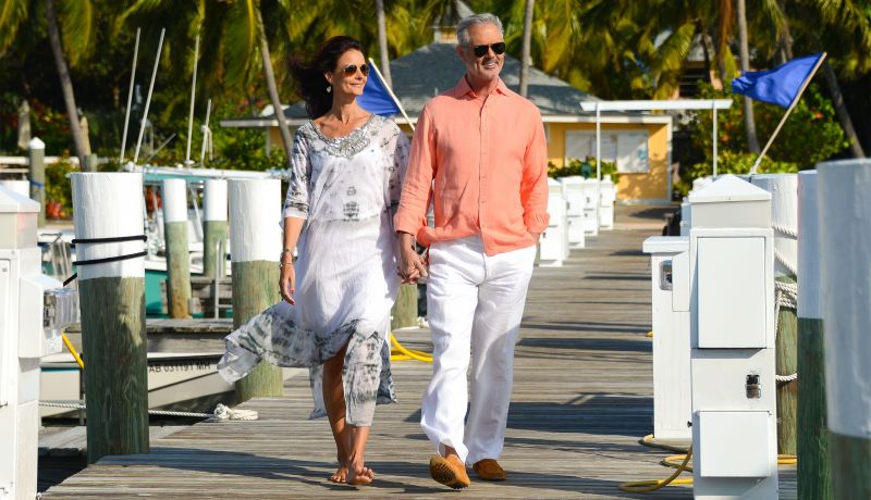 Brand Center | Boating: Couple in marina | caribbeantravel.com